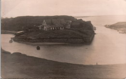 A VER OLD PHOTO OF SEATON SLUICE SHOWING A HOUSE BOAT AND A BUILDING OF UNKNOWN ORIGIN, NOTICE THE ABSENCE OF HARBOUR WALLS OR ANY DEFENCES, COPYRIGHT C PERRETT